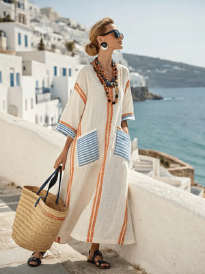 Back view of the green Elara maxi dress, illustrating the comfortable and relaxed fit for summer days.