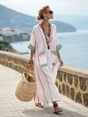 Three different color variations of the Elara maxi dress hanging, displaying the range of choices available.